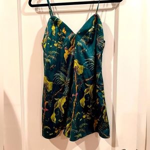 By The Way Romper. Silk floral pattern with leaves and birds.